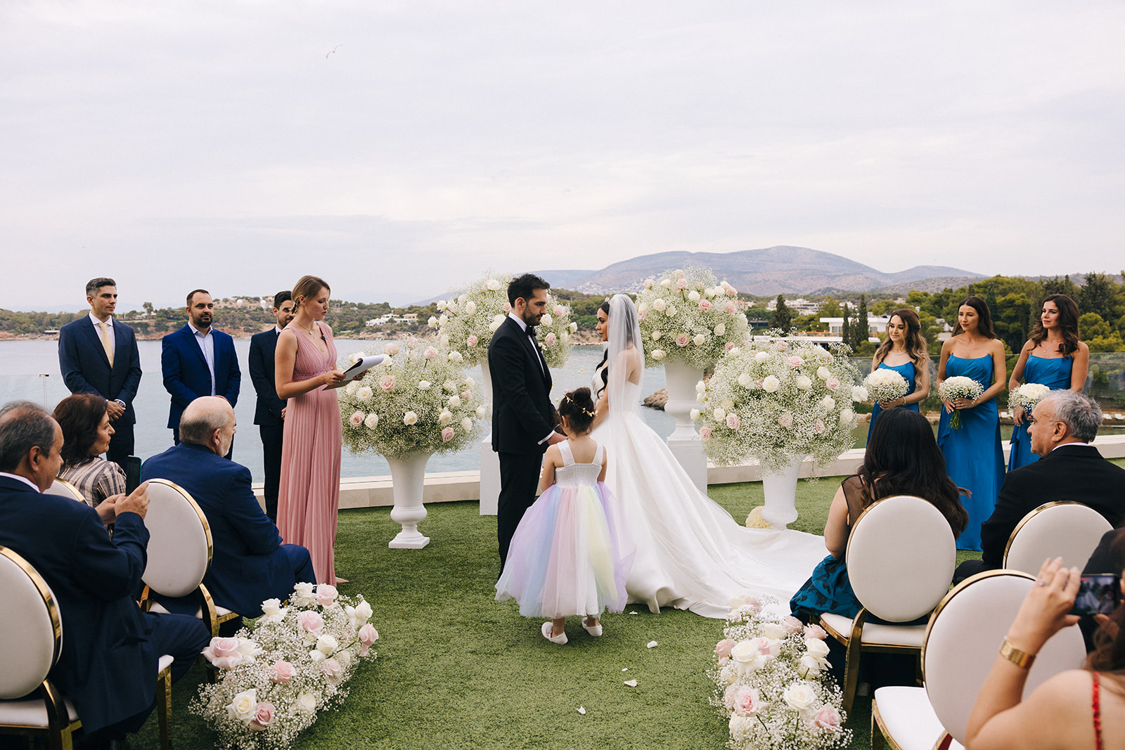 Wedding celebrant conducting a wedding ceremony in Greece